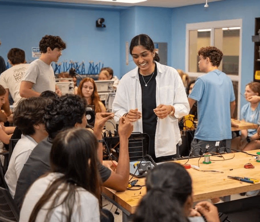 Group of volunteers building adaptive toys together